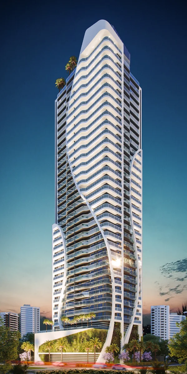 Torre residencial iluminada à noite — Arquitetura Digital